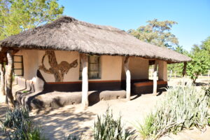 NGAMO VILLAGE HWANGE ZIMBABWE TRADITIONAL NDEBELE HOUSE ZAZU VOYAGE